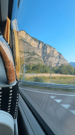 Rolling through Mezzolombardo from a bus window seat