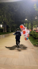 Evening scenes in Yerevan: balloon vendor, video call