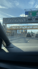Vehicle travels London streets with navigation system active