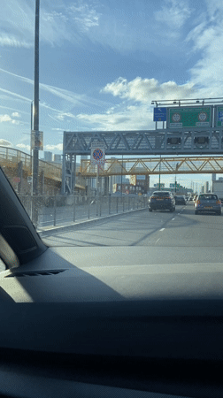 Vehicle travels London streets with navigation system active