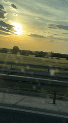 Tow truck carries damaged white car on Serbian highway