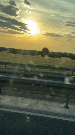Tow truck carries damaged white car on Serbian highway