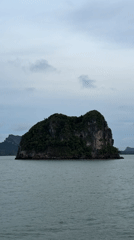 Overcast seascape with rocky islands filmed near Don Sak, Thailand