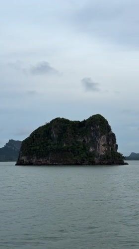 Overcast seascape with rocky islands filmed near Don Sak, Thailand
