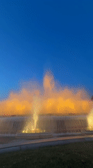 Magic Fountain of Montjuïc glows at dusk in Barcelona
