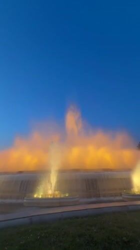 Magic Fountain of Montjuïc glows at dusk in Barcelona