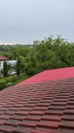Rain shower observed from rooftop perspective in Zornitsa, Bulgaria