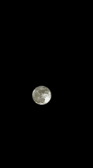 Full moon observed over Paris with changing colors