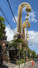 Traditional penjor ceremonial poles observed on Ubud street