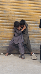 Kids, a puppy, and a makeshift Ferris wheel in Quetta