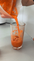 Freshly blended orange juice poured and served in Kiparisnoe
