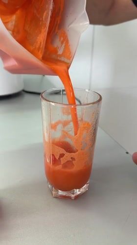Freshly blended orange juice poured and served in Kiparisnoe