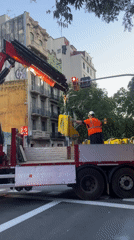 Musicians rehearse on Barcelona stage amid nearby construction activity