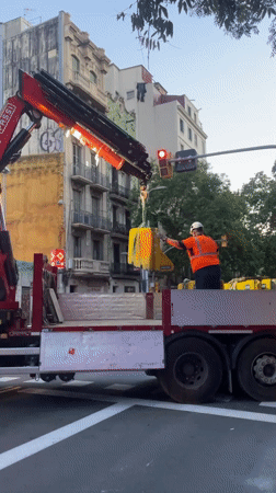 Musicians rehearse on Barcelona stage amid nearby construction activity