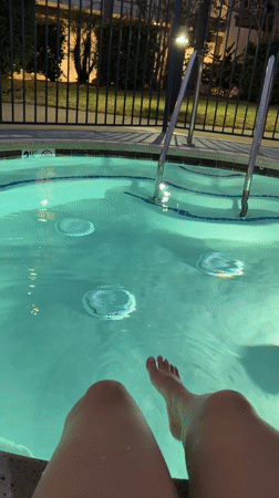 Evening hot tub soak with jets running and streaming queued up
