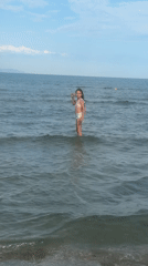 Lazy summer afternoon on a beach in Mandra, Greece