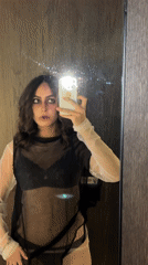 Person takes mirror selfies in Mexico City bathroom
