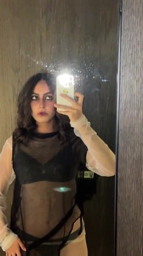 Person takes mirror selfies in Mexico City bathroom