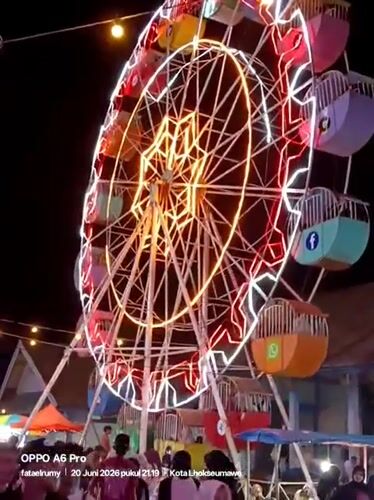 Night fair lights up Lhokseumawe with rides, crowds, and a book bazaar