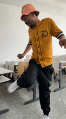 Man dances solo in empty classroom in Beijing suburb