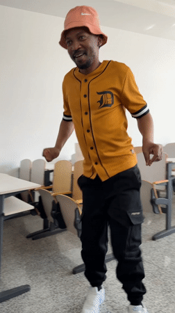 Man dances solo in empty classroom in Beijing suburb