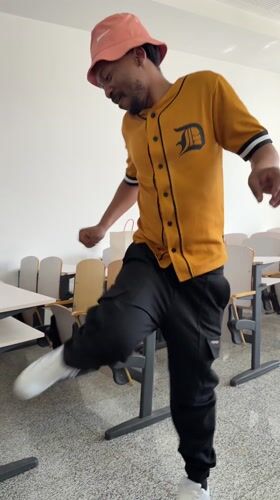Man dances solo in empty classroom in Beijing suburb