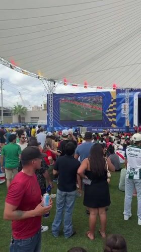 Outdoor soccer watch party in Houston with live drums and street snacks