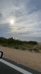 Sunny ocean view captured from Moroccan coastal road