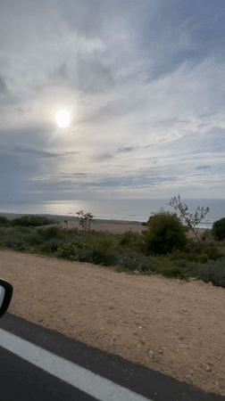 Sunny ocean view captured from Moroccan coastal road