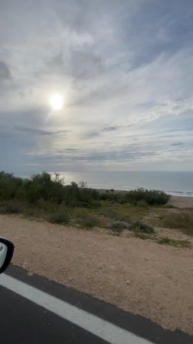 Sunny ocean view captured from Moroccan coastal road