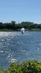 Windsurfer enjoys sunny afternoon on Vienna lake