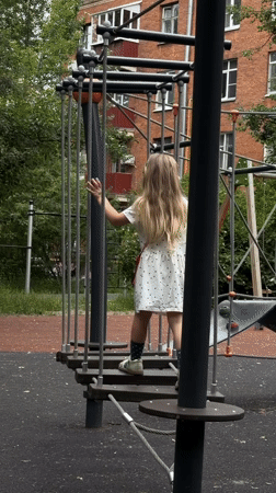Standing on a suspended playground platform in Khimki, Russia