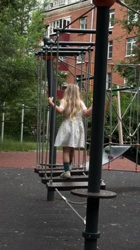 Standing on a suspended playground platform in Khimki, Russia