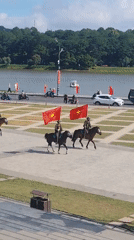 Ceremonial equestrian parade and martial arts demonstrations in Da Lat
