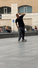 Skateboarders practice tricks at Barcelona's MACBA plaza