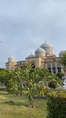 Mosque and street traffic documented in Lhokseumawe, Indonesia