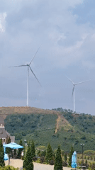 Wind turbines operate on agricultural hills in Vietnam