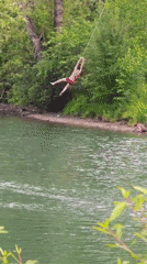 Rope swings and pedal boats on a sunny Abakan river day
