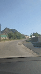 Driving through Lermontov with mountain backdrop