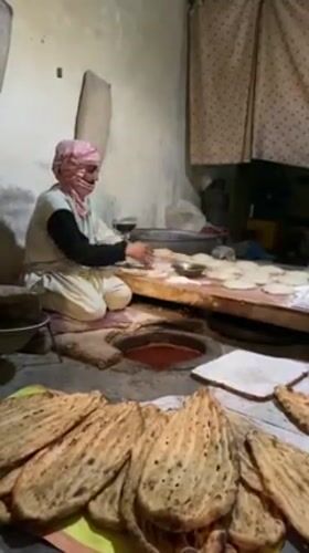 Traditional bread making documented at Kandahar bakery