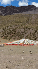 Prayer flags captured in mountainous landscape, Parga China