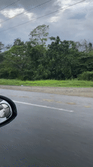 Driver records wet road conditions in flood-prone Carmen area