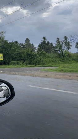 Driver records wet road conditions in flood-prone Carmen area