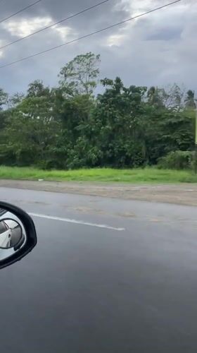 Driver records wet road conditions in flood-prone Carmen area