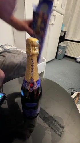 Private celebration with champagne and whiskey documented in Katwijk