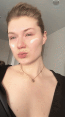 Woman documents morning skincare routine in Kazan bathroom selfies