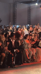 Fashion show draws phone-recording crowds in Paris