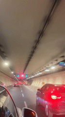 Vehicle travels through lit tunnel in Üsküdar, Turkey