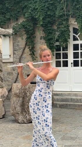 Live flute performance on Budva's cobblestone streets