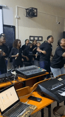 Music group rehearses with equipment in Dar es Salaam classroom
